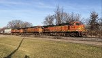 BNSF 5404 leads the empty grainer.